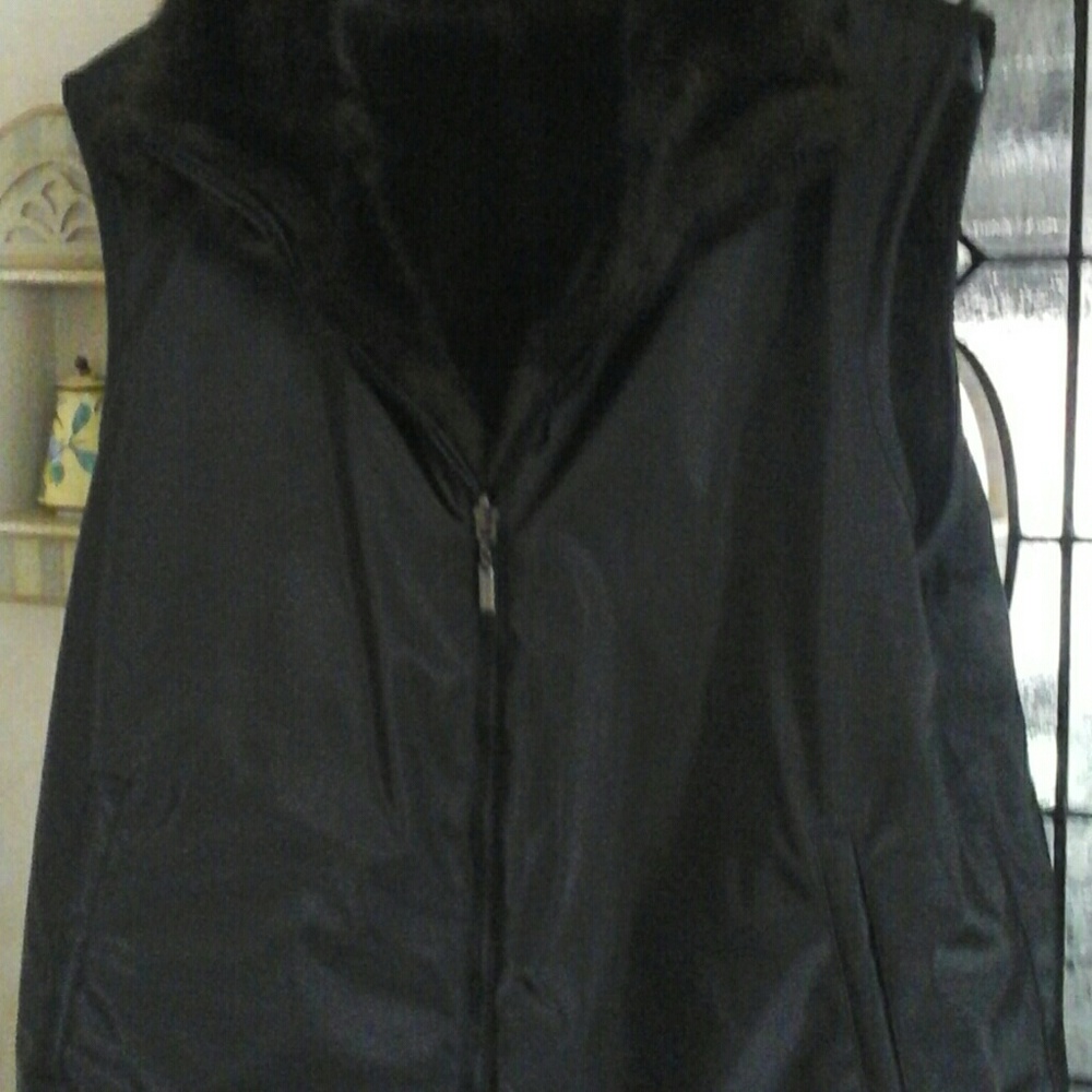 Fur (faux) reversible vest.